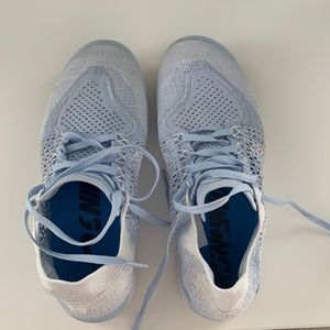 Light blue Nike running shoes size 9